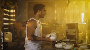 Drug Dealer Placing Drug Bricks into Suitcase is Arrested by a Fully Armed Special Anti-Narcotics Task Forces Soldier. Dealer Raises Hands and Surrenders.