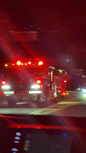 For SuffolkcountyFDphoto, Smithtown fire department fire truck on the road with its sirens on