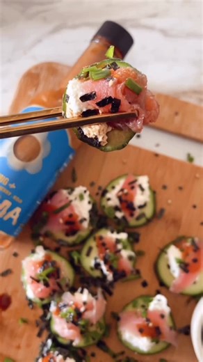 ℂ𝕦𝕣𝕒𝕥𝕖𝕕 𝕂𝕖𝕥𝕠 𝕓𝕪 𝕄𝕖𝕝𝕠𝕕𝕪 ℂ𝕠𝕟𝕥𝕖 on Instagram: "✨MY MOST VIRAL VIDEO OF 2025✨ Happy New Year, everyone!!! So thankful for every like, comment, share, and message this year. Your support truly means more than you know. Cheers to growth, joy, and showing up together in the year ahead 🤍 INGREDIENTS: - cucumber, sliced - cream cheese - @traderjoes Sesame Crusted Smoked Ahi Tuna - @onima.pantry IL MIG Koji Hot Sauce - chives or green onion, chopped - furikake seasoning - soy sauce,