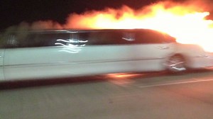 Flames engulf limo, trap passengers