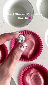 Flat cupcakes are better IMO. These Heart shaped cupcakes are super easy to make & so fun! You just crumple up a ball of foil to create the middle of the cupcake and put 2 square pieces on the side. Don't throw them out after baking. You can reuse them! #heartshaped #baking #pinkcupcakes #cupcakes #howto #watchmework #cupcakedecorating #onmytable #bakefromscratch #valentinescupcakes #vanillacupcakes #cakebatter #bakingtips | Sophia Mya Cupcakes