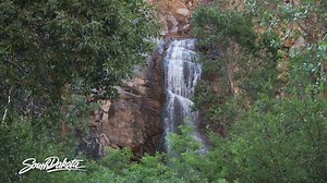 3.6K views · 491 reactions | You may want to turn up the volume and listen to the water cascade down this sheer 60-foot cliff, aka Bridal Veil Falls! | Travel South Dakota | Facebook