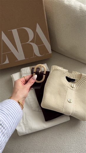 Elegant Spring Styling with White Jeans and Knitted Waistcoat