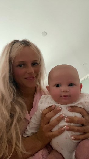 Caring Moments: A Mother and Baby Bonding