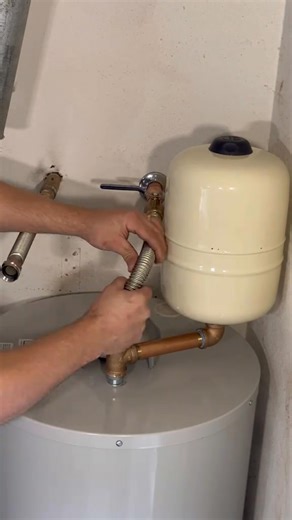 installing a hot water heater like a man | hero home