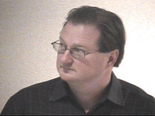 LogTM: Log-based Transactional Memory