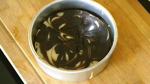 Let's learn to make a very easy and tasty Eggless Marble Cake in a pressure cooker. | MadhurasRecipe