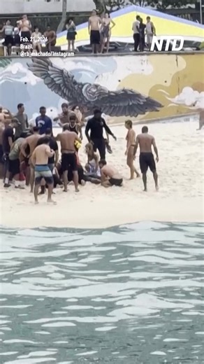 A delta-wing instructor and a U.S. tourist died in an accident on a beach in Rio de Janeiro on Feb. 21, according to Brazilian media. | NTD Life