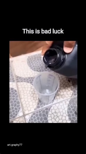 ArtGraphy on Instagram: "💦 The video captures a surreal optical illusion where a dark teal liquid, being poured from a black container, appears to instantly solidify in mid-air, forming a rigid arch as the bottle is pulled away. Surfaced on Reddit’s r/blackmagicfuckery community in 2026, the viral clip titled "This is not bad luck, this is something else" has accumulated thousands of interactions, confusing viewers with its apparent defiance of gravity and fluid dynamics. While the footage spar