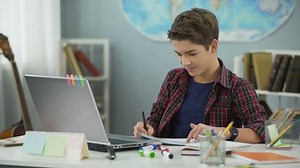 Smart Teenage Kid Diligently Doing Homework Stock Footage Video (100% Royalty-free) 1015363945 | Shutterstock