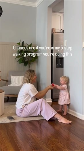 Courtney | Pediatric Occupational Therapist on Instagram: "Heres why I recommend this Instead of practicing hand-held walking.. When we hold both of a baby’s hands while they walk, we’re doing a lot of the balance work for them. Their trunk stays supported, their weight shifts less, and they don’t get as many opportunities to practice the small balance corrections needed for independent steps. The lack of core and posture control is even more compromised when we hold their hands up high by their