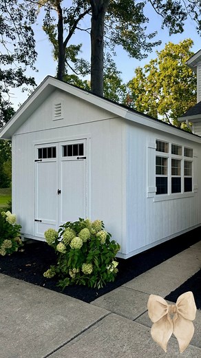 Erika Lauren on Instagram: "SHED PROJECT - Part 1: Surprise! We had a shed built from @heartlandsheds (gifted) - Heartland has so many sheds to choose from in a bunch of sizes, and the prices on their website include delivery and install! This shed will become my future workshop for all things DIY and crafting! I’m going to have it finished out and take you along for that and as we organize it, but first I want to tell you about this amazing shed! The model is called the LUMINA - it features 3 o