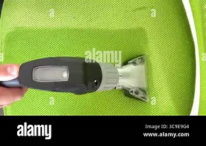 Clean the carpet with a cleaning vacuum cleaner. The vacuum cleaner spray water with cleaning agent on the carpet. Clean up the house. Smart household