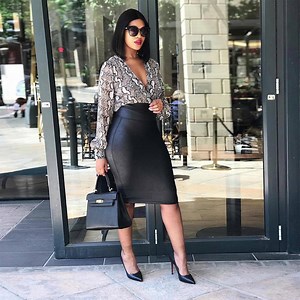 We know you love our faux leather leggings. So we went back to the drawing board to make our first ever Faux Leather Pencil Skirt 🙌. Same flattering fabric, same comfortable fit. You're welcome. | SPANX