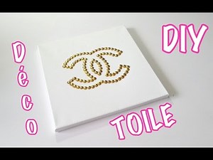DIY Chanel logo frame decoration with pins