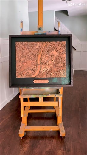 From city to sculpture, the making of a 3D Loveland map. Our 3D Loveland, OH map begins with the careful digital mapping of every street, neighborhood, and landmark of the downtown area. The details are then transformed into dimensional forms, creating the layered topography of the city. From this digital model, a custom mold is produced and cast. Every piece is then hand-finished to bring out depth, texture, and character before being professionally framed by @galleryveronique | The Garage Guy 