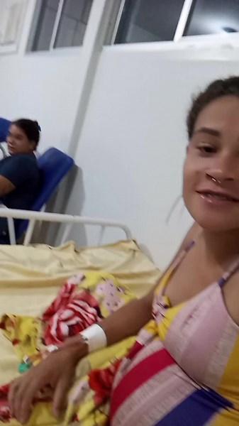 Hospital Patient Expressing Themselves in Bed