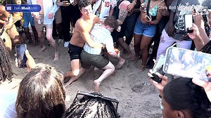 Spring breakers take over the beach and boardwalk in Fort Lauderdale