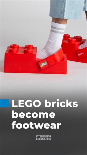 LEGO and Crocs have teamed up to launch bold Brick Clogs that bring the classic toy aesthetic into wearable fashion. The playful design blends oversized LEGO studs with Crocs’ signature comfort, turning childhood nostalgia into a statement piece. | Interesting Engineering