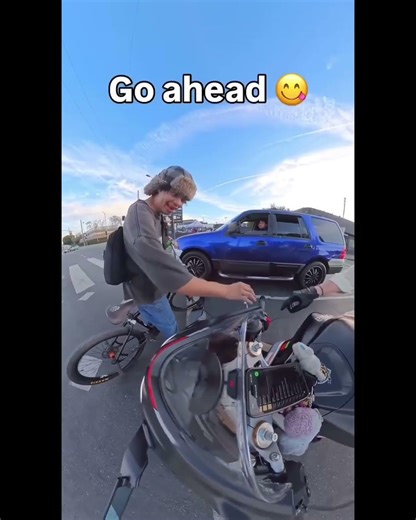 heartwarming moment: polite kid asks biker to rev the engine
