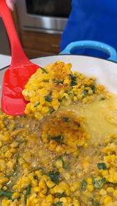 7.2K views · 48 reactions | Yummy corn fritters Olivia uses thawed frozen corn, cheddar cheese, green onion, cilantro, eggs, flour, salt and oil to make a fried, delicious dish. This original video was produced by Network Media LLC and Olivia | Olivia | Facebook