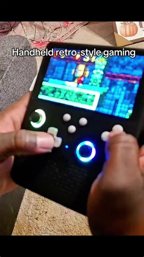 This handheld retro-style game console features dual joysticks, a bright screen, and colorful RGB lighting for an immersive gaming experience. Designed for smooth, responsive gameplay whether you’re playing at home or on the go. #dualjoystick #rgbgaming #portableconsole #casualgaming #gamingonthego