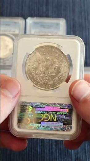 NGC vs. PCGS: 1884-O Morgan Dollar Coin Grading Battle!