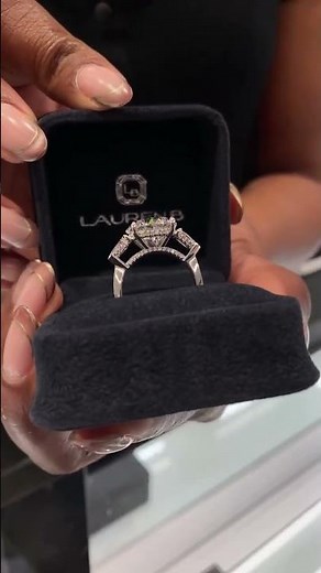 Round Diamond Three-Stone Ring With Pears