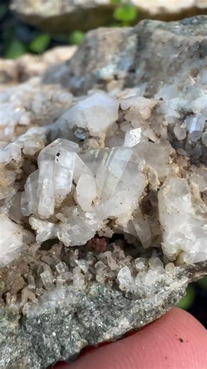 Large sparkling plates of beautiful Albite (exact feldspar variety currently unknown) crystals on a Glaucophane host. Hard to clean, so I haven’t taken many videos of them, but mined a good amount of plates near a stream just about 1/4 mile from my front steps.. in case anyone is interested in a specimen or two 🙂. I keep hoping I’ll eventually find some with intense adularescence, sizeable Garnets, and/or Lawsonite occurring alongside these pretty crystals. Wouldn’t that be sweet for a front ya