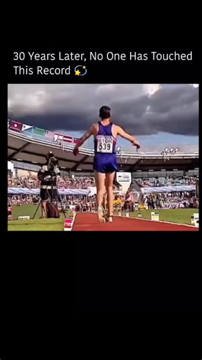 the error on Instagram: "The nistagram reel. Since 1991, the men's long jump world record has remained untouchable. Mike Powell soared 8.95 meters at the World Championships in Tokyo, shattering Bob Beamon's 1968 record and setting a mark that still leaves athletes in awe. Even with faster tracks, smarter training, and modern sports science, no one has come close - champions today still fall 20-30 cm short. Experts call Powell's leap the peak of human explosive ability, making it one of track an