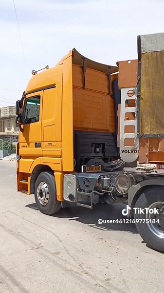 Exploring the Bright Yellow Mercedes-Benz Truck