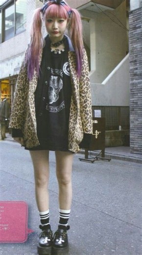 Discussing Aesthetics on Instagram: "Pastel Goth was Tumblr’s sweetest rebellion. Born in the early 2010s, itt fused soft candy colors with occult edge. hink lavender hair with black lipstick, pentagram chokers paired with Hello Kitty backpacks, skeleton tights under pastel sweaters. It was kawaii meets creepy, Sailor Moon meets Satan. The look thrived on DIY, Etsy shops, and endless Tumblr moodboards: bats, crosses, galaxy prints, and Lisa Frank gone dark. The soundtrack was Melanie Martinez de