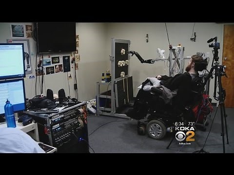 Mind-Controlled Robotic Arm Allows Paralyzed Man To Feel, Move Objects