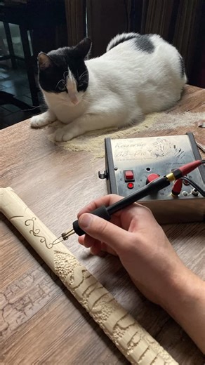 Cornelius Creations | Custom Blades & Woodwork on Instagram: "Anyone else have a shop pet? #woodburning #pyrography #razertip"