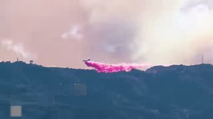 80K views · 508 reactions | The red fire retardant being dropped from airplanes on California wildfires is not harmful to humans or animals, per authorities. | USA TODAY | Facebook
