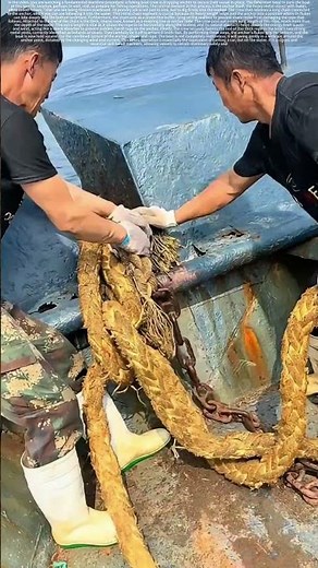 Fishermen Securing Their Boat with an Anchor