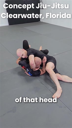 🔒 Front Headlock to Side Control Transition! 🔒 Professor Brian demonstrates a smooth way to advance from front headlock to dominant side control—maintain that grip and flow: 1️⃣ Secure the Front Headlock – Lock in with control over their head and arm. 2️⃣ Punch the Underhook – Drive your underhook arm towards their hip for leverage. 3️⃣ Switch Your Legs – While punching, switch your legs to off-balance them. 4️⃣ Drop the Knee – Bring your left knee down as their body goes low. 5️⃣ Maintain Hea