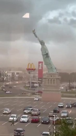 This is the moment a replica Statue of Liberty was blown down in Brazil's Rio Grande do Sul during a severe storm.