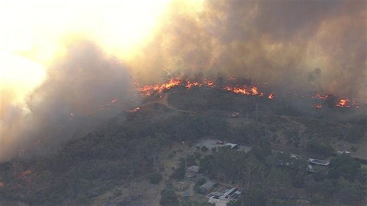 Bushfire warning downgraded for blaze in Darlington, Helena Valley in Perth's eastern suburbs