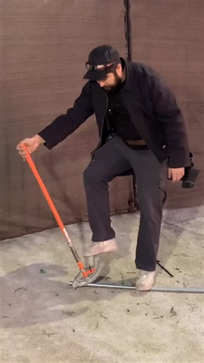 Oaks Woodworks & Builds on Instagram: "Bending a 3/4 inch EMT Electrical, conduit for a landing. I am using a tubing cutter and a tubing deburrer tool"