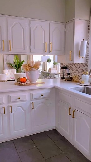 Kitchen DIY Transformation. Let me show you how …………. I transformed my old cabinet with these beautiful hardware from @goldenwarm_official, check them out. Been doing this project for a while . At first wanted to hire a contractor but the asked me $1500 to install them for me and I decided to do it myself and didn’t cost me a penny. And thanks to all of you for your suggestions I painted the hinges white. This my kitchen now until I have money for a brand new one 😄 click on my linktree to shop 