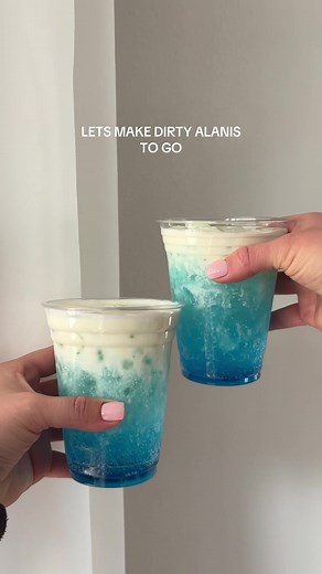 Dirty alanis with white peach, blue raspberry with the winter wonderland alani and a marshmallow coconut cold foam. #dirtyalaninu #dirtydrinks #easydrink #mocktail #mocktailrecipe @Alani Nutrition @Torani @Monin Americas @jetpuffed @target