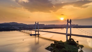 These extraordinary aerial shots from 39 cameramen offer a refreshing perspective of China's Xiangjiang River, a major Yangtze tributary, and the 25 urban bridges it boasts. | China Xinhua News