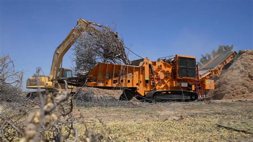 Efficient wood waste processing in outdoor work area