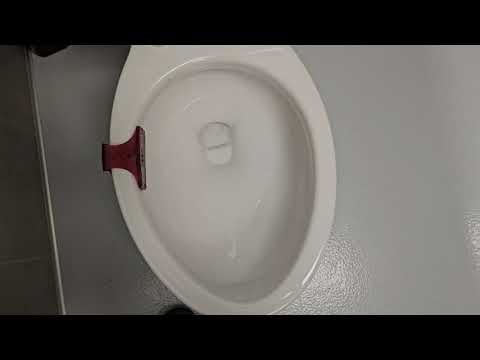 Grocery Store Men's Restroom with New AS Fixtures