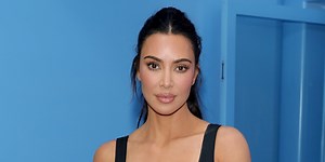 Kim Kardashian's swimsuit and faux-leather sweatpants lewk is giving Matrix chic