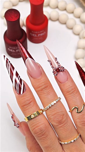 Kiara Sky Nails Official on Instagram: "Would you keep the bow subtle… or go even bigger? 👀 Holiday sets get extra when there’s texture involved, and this 3D Flex Gel bow is doing exactly what it needs to do. Classic red, and a glossy sparkle courtesy of @kiaraskynails Gel Pro Collection. In the look: ✨ Gel Pro – Blush Crush ✨ Flex Gel ✨ Silicone Applicator ✨ Gel Pro – Kiss of Death ✨ Gel Pro – Sweet Seduction ✨ Gel Pro – True White ✨ HEMA Free Non Wipe Topcoat #kiarasky #kiaraskynails"