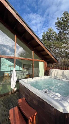 Clo & Brandon | Adventure & Travel Couple on Instagram: "Somewhere between adventures, you find places like this. A cabin in Scotland, where we slow down for a few days before the next chapter.🏴󠁧󠁢󠁳󠁣󠁴󠁿💙🚙 #forestholidays #scotland #cabin #travel #explore"