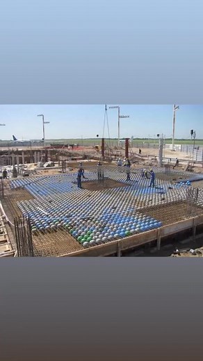 Bubble deck slab is a type of concrete floor slab that incorporates hollow plastic balls or spheres within the concrete to reduce its weight. These hollow spheres are usually made of materials like expanded polystyrene (EPS) or recycled plastic. The concept behind a bubble deck slab is to maintain the structural integrity of the slab while significantly reducing its weight. This has several advantages: 1. **Reduced Weight:** By replacing some of the concrete with lightweight plastic spheres, the