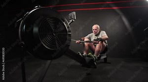 Close Up of 50s or 60s Old Man Training Hands at Rowing Machine. Workout of Healthy Elderly Male or Fast Warming Up Inside Fitness Hall. Active Lifestyle or Wellness of Senior Confident Person at Gym Stock Video